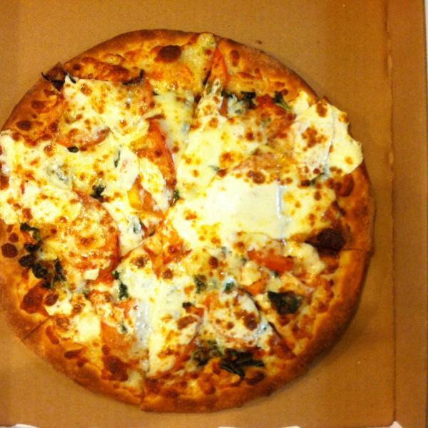 Margherita Pizza (Thin Crust) · Fresh mozzarella cheese, tomato and fresh basil. 
