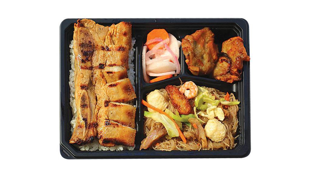 Grilled Liempo Bento Bx · Served with Pancit Bihon, Fish Fritters, Pickled Radish, and Rice.