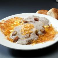 Country Breakfast Bowl Breakfast Special · Hash browns topped with 3 scrambled eggs, sausage, cheddar cheese, and country sausage gravy...