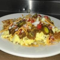 Southwest Bowl Breakfast Special · Hash browns topped with 3 scrambled eggs, chili, cheddar cheese, tomato, onion, and jalapeño...