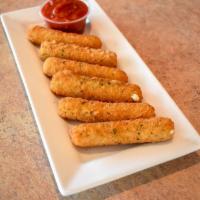 Fried Mozzarella Cheese Sticks · Served with ranch. Add extra ranch sauce for an additional charge.