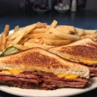 Grilled Ham and Cheese Sandwich · Comes with fries. Smoked ham and American cheese.