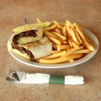 Philly Cheese Steak Wrap · Shaved steak with grilled onions, peppers, and Swiss cheese.