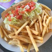 Chicken Sub · Grilled chicken breasts with shredded lettuce, tomatoes, melted Jack cheese, and Italian dre...