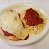 Chicken Parmesan · Sauteed chicken breasts covered with Italian meat sauce, topped with cheese and served with ...