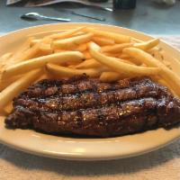 Classic NY Strip Dinner · USDA choice strip steak served tender and juicy. 