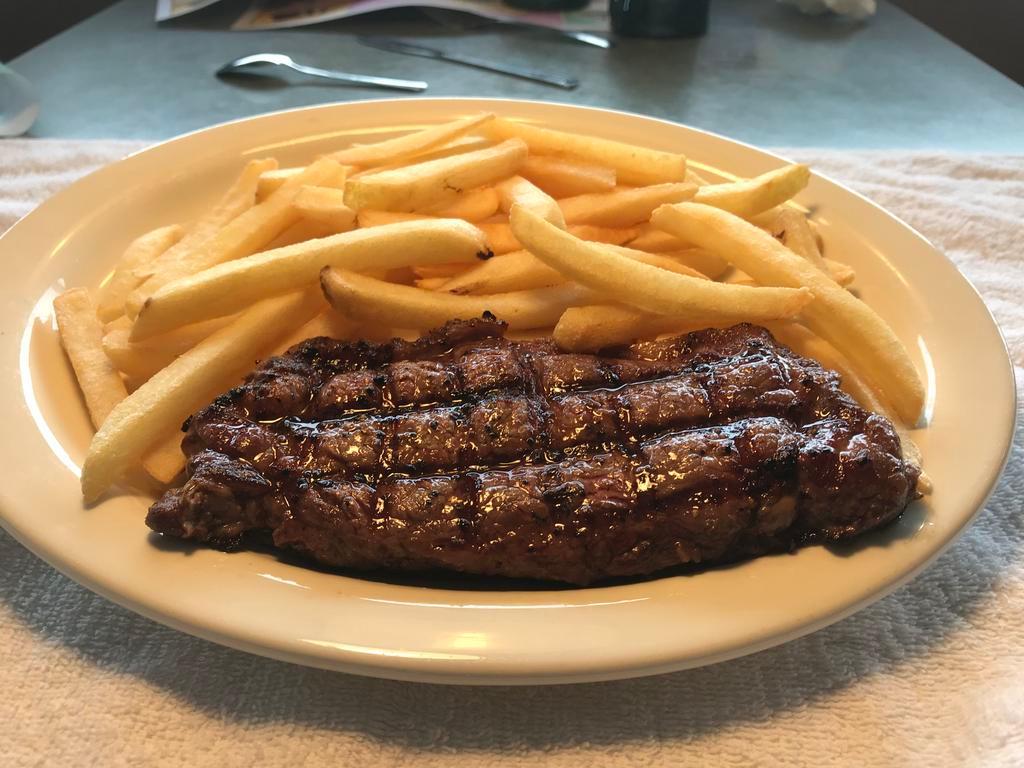 Classic NY Strip Dinner · USDA choice strip steak served tender and juicy.
