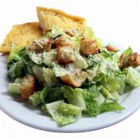 Caesar Salad · Romaine lettuce, Parmesan cheese, gourmet croutons, and creamy Caesar dressing.