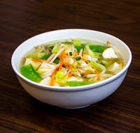 S06. Vegetable Tofu Soup 蔬菜豆腐汤 · Large. Vegetarian soup with broccoli, green bean sprout, carrot, pea and tofu.