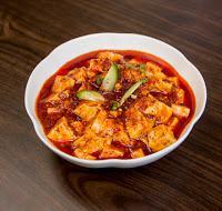 T05. Soft Tofu with Spicy Chili Oil Sauce 水煮豆 腐 · Braised with napa, green bean sprout, long leek in spicy chili oil, peppercorn, and powder a...