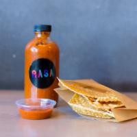 That Fire Hot Sauce (Bottle) · RASA's homemade hot sauce with fiery habanero and thai chili peppers. 
 8oz glass bottle.
