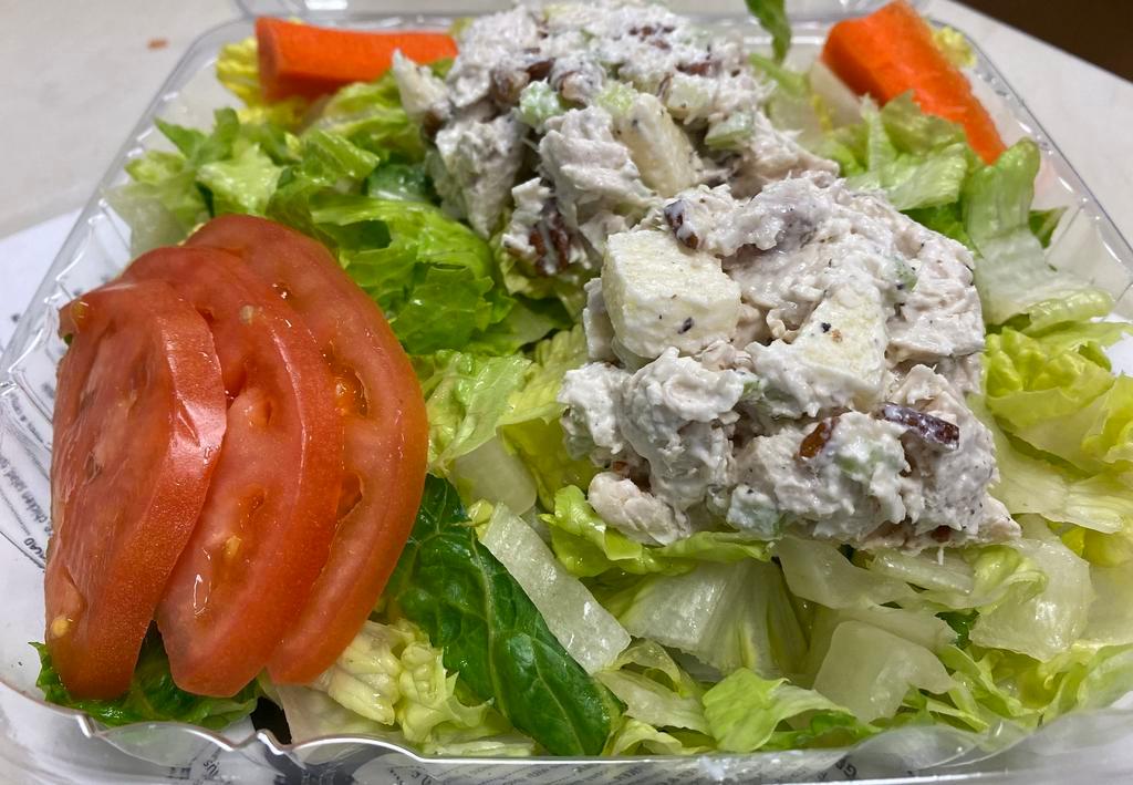 Chunky Chicken Salad Plate · Romaine lettuce, chicken salad, tomatoes, and carrot stick. The house dressing is homemade garlic Thousand Island Dressing. We also offer Caesar, Italian, ranch, honey mustard, and bleu cheese, balsamic vinaigrette.