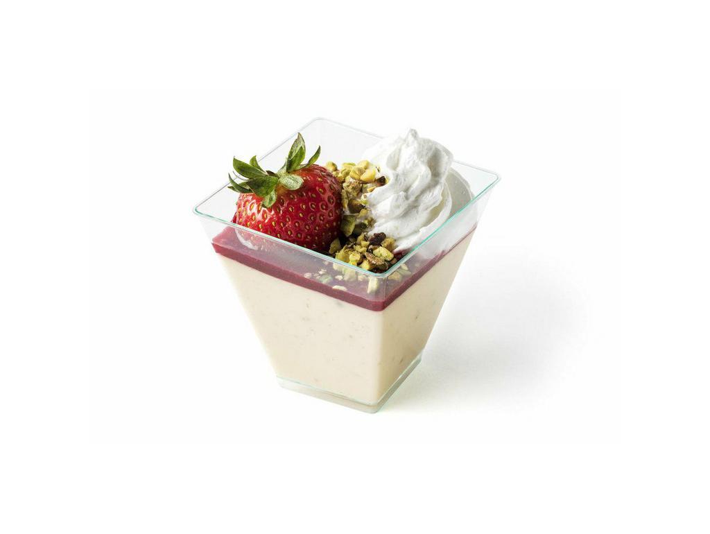 Fresh Strawberries & Cream Crème Brulee · Whole fresh strawberries blended into vanilla bean custard topped with sweet raspberry coulis, a strawberry, chopped pistachios and whipped cream
