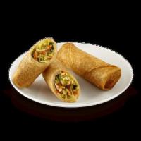 Veggie Spring Rolls (2) · Veggie Spring Rolls are prepared with a mixture of cabbage, celery, carrots, green onions an...