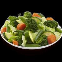 Side Mixed Vegetables · Mixed Veggies is a stir-fry combination of fresh broccoli, zucchini, carrots, string beans a...