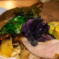 Sapiens Duck · Leg of duck confit aged in herb-infused fat meets delicate duck breast. Served with roasted ...