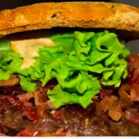 Sapiens Burger · Our signature burger. Grass-fed beef, shallot chutney, organic arugula greens, nitrate-free ...