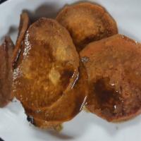 Sweet Potatoes · Organic sweet yam with vanilla-maple glaze. Vegetarian.