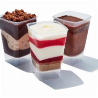 Mini Dessert Shooters · Chocolate fudge or  strawberry cheesecake.