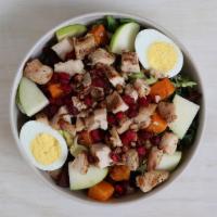 Winter Cobb Salad · GOOD greens, chicken, bacon, hard boiled egg*, butternut squash, avocado, cucumbers, grape t...