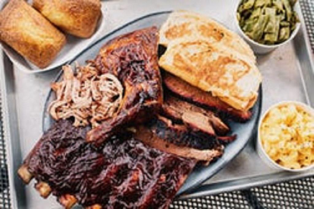 Judge's Sampler with 2 Individual Sides · Brisket, pulled pork, 1/4 chicken, half slab of ribs, two pint sides, two cornbreads, Texas toast. (Feeds 2–3)