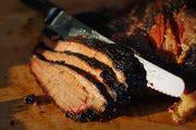 Beef Brisket with Two Sides · Award-winning for a reason: smoked for up to 18 hours and always carved to order