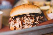 Pulled Pork · Hand-rubbed, smoked over local hickory wood, and pulled to order