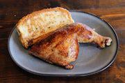 Chicken Leg & Thigh with Two Sides · A hickory-smoked quarter chicken—just the dark meat—served with Texas toast