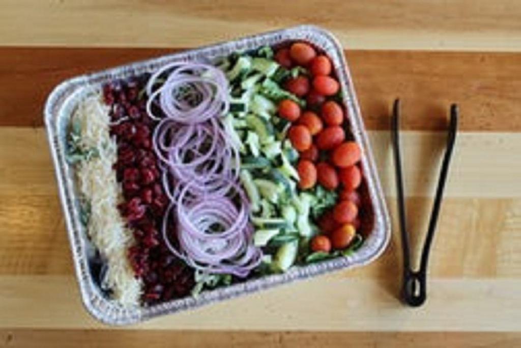 Small Party Salad · Enough spring mix, cucumbers, tomatoes, cheese, and onions for 10–12 folks
