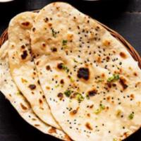 Garlic Naan  · Freshly baked naan in a clay oven topped with finely chopped garlic and cilantro.