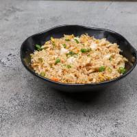 32A. Chicken Fried Rice · Com chien ga. Stir-fried rice with chicken, eggs, peas and carrots.