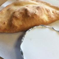 Plain Calzone · Ricotta and mozzarella. Add extra toppings for an additional charge.