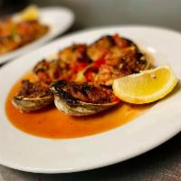 Clams Casino · Stuffed with roasted peppers and bacon.