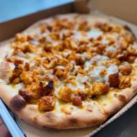 Buffalo Chicken Pizza · Grilled chicken in hot sauce with bleu cheese, topped with mozzarella.