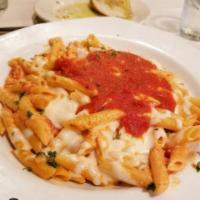 Baked Ziti Dinner · Ricotta cheese with a touch of cream and marinara sauce then topped with mozzarella cheese. ...