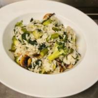Vegetable Risotto Dinner · Fresh broccoli, mushrooms, spinach, and asparagus in a white wine sauce. Served with choice ...
