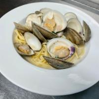 Clams Dinner · Over linguine in choice of sauce. Served with choice of side.