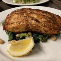 Salmon Neretto Dinner · Blackened salmon with cannellini beans and broccoli rabe, sauteed in garlic and extra virgin...