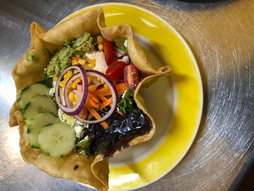 Taco Salad · Served with choice of meat, lettuce, tomatoes, black beans, Mexican cream, fresh cheese, red onions, cilantro, guacamole and salsa in tortilla shell.