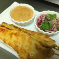 Chicken Satay · 4 pieces. Marinated chicken breast grilled on skewers served with peanut sauce and cucumber ...
