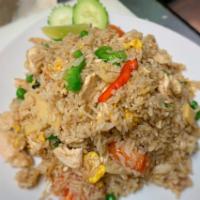 Thai Thai Fried Rice · Fried rice with egg, onion, sweet pea, tomato a hint of seasoning.
