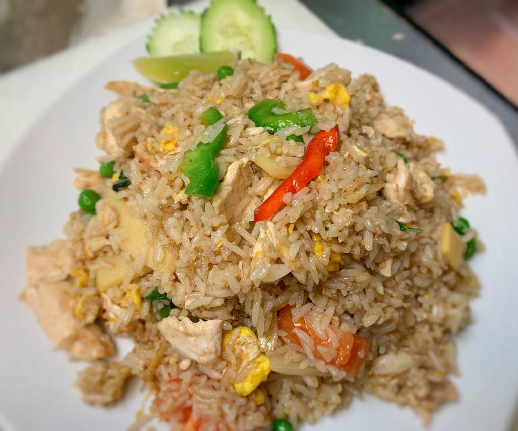 Thai Thai Fried Rice · Fried rice with egg, onion, sweet pea, tomato a hint of seasoning.