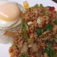 Pad Kra Pao · Original Thai-style basil stir-fry. Choice of minced chicken, minced pork, or tofu. Served w...