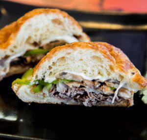 Philly Bastilly Sandwich · Roast beef, provolone, mushrooms, green peppers, and onion.