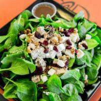 Florentine Salad · Fresh spinach salad with roasted chicken breast, sliced strawberries, walnuts, dried berries...