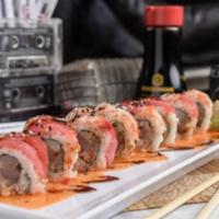 Jam Sesh Roll · Yellowtail, albacore tuna and spicy mayo. Topped with red tuna, crabmeat, eel sauce, sweet c...