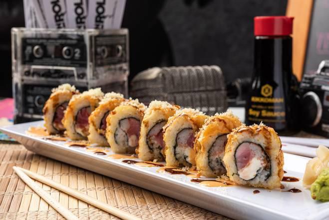 Velcro Pygmies Roll · Red tuna, crabmeat and cream cheese, whole roll is fried and topped with spicy mayo, eel sauce and crunchy flakes.