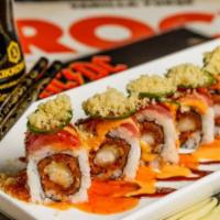 Crowd Surfer Roll · Shrimp tempura and spicy tuna. Topped with red tuna, jalapeno, sweet chili sauce, eel sauce,...