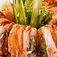 Groupie Roll · Spicy tuna, cream cheese, cucumber, avocado and shrimp tempura. Topped with crabmeat, eel sa...