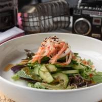 Cucumber Salad · Crabmeat and thinly sliced cucumbers served on a bed of spring mix. Glazed with ponzu, sweet...